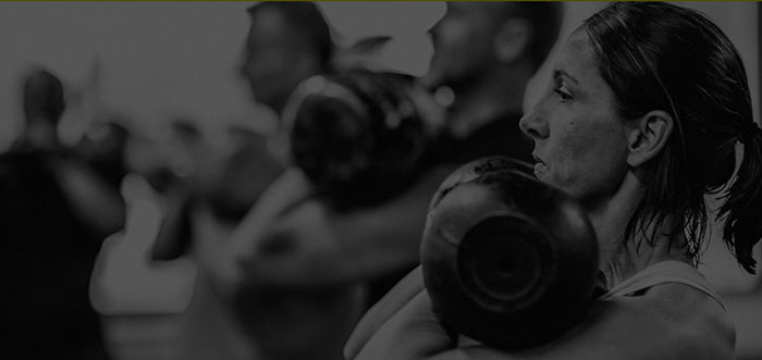 Group of people working out at Alloy